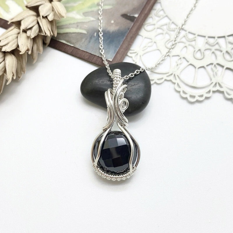Sterling zilveren wire wrap hanger met zwarte Spinel