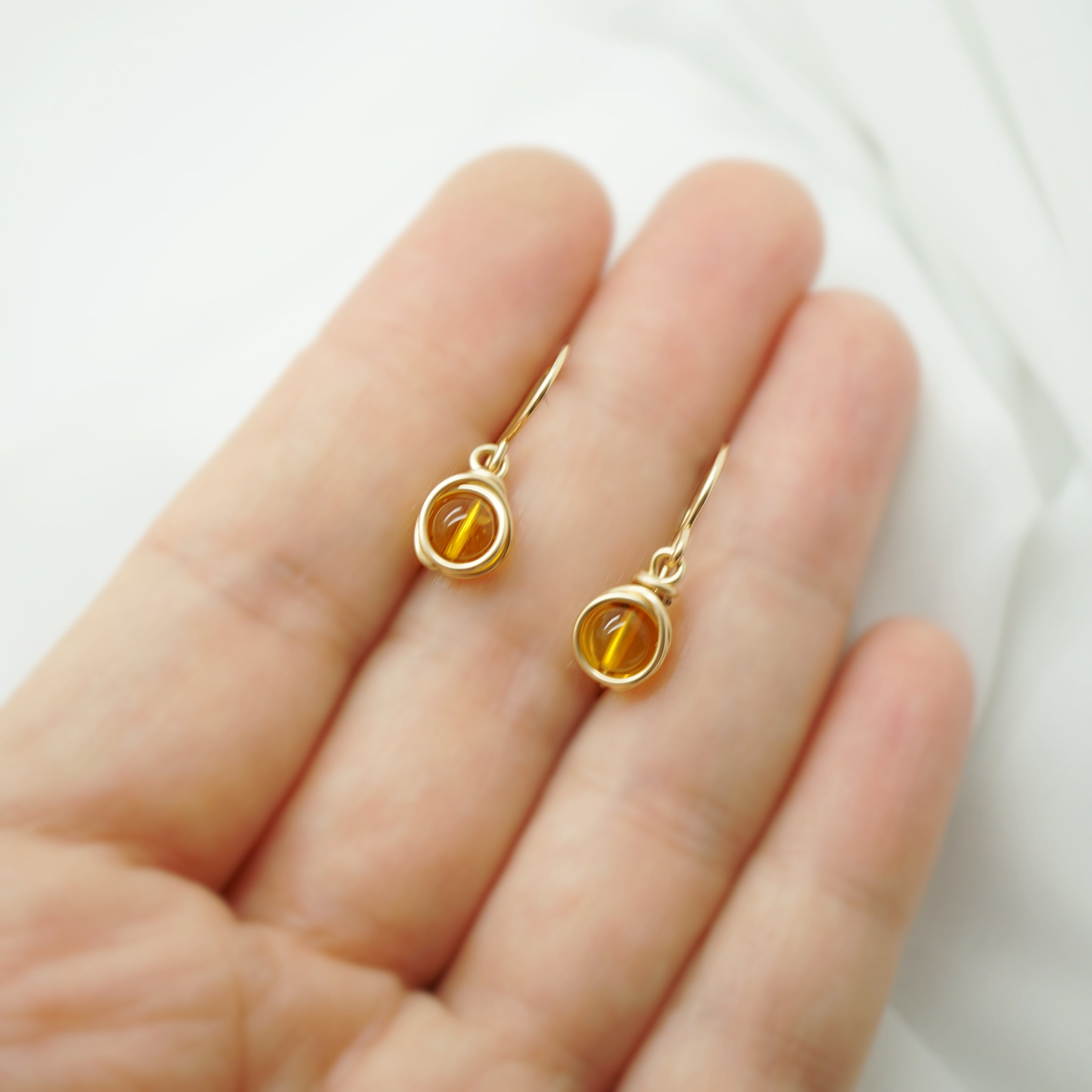 14k gold filled oorbellen met barnsteen