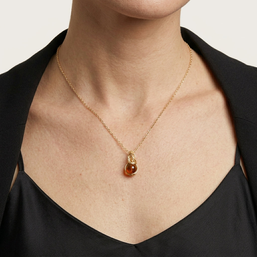 Sierlijke 14k gold filled wire wrap hanger met barnsteen