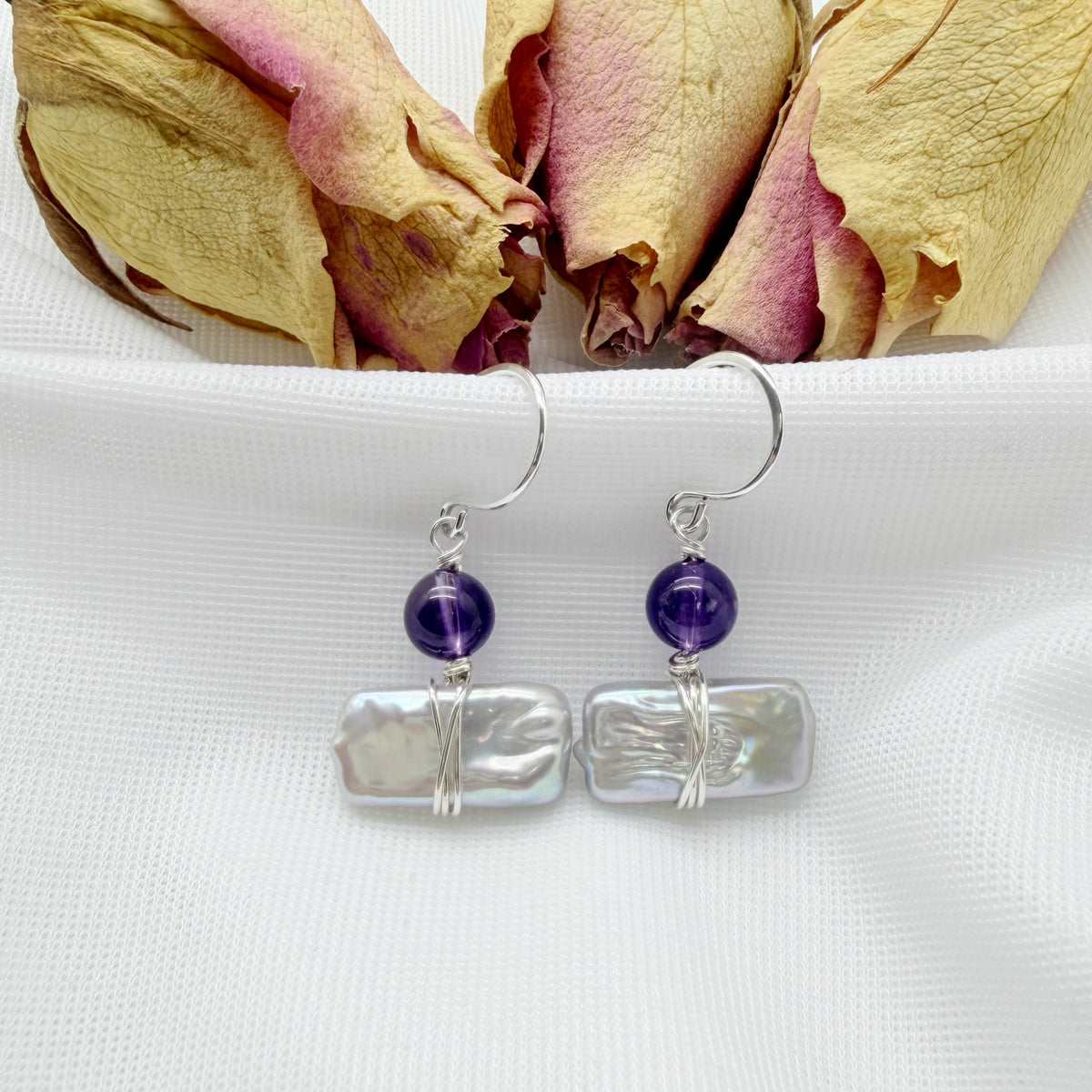 Oorbellen met zoetwaterparel en amethist van sterling zilver