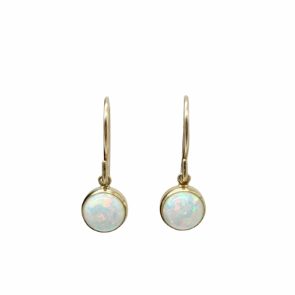 Kleine gold filled oorbellen met opaal